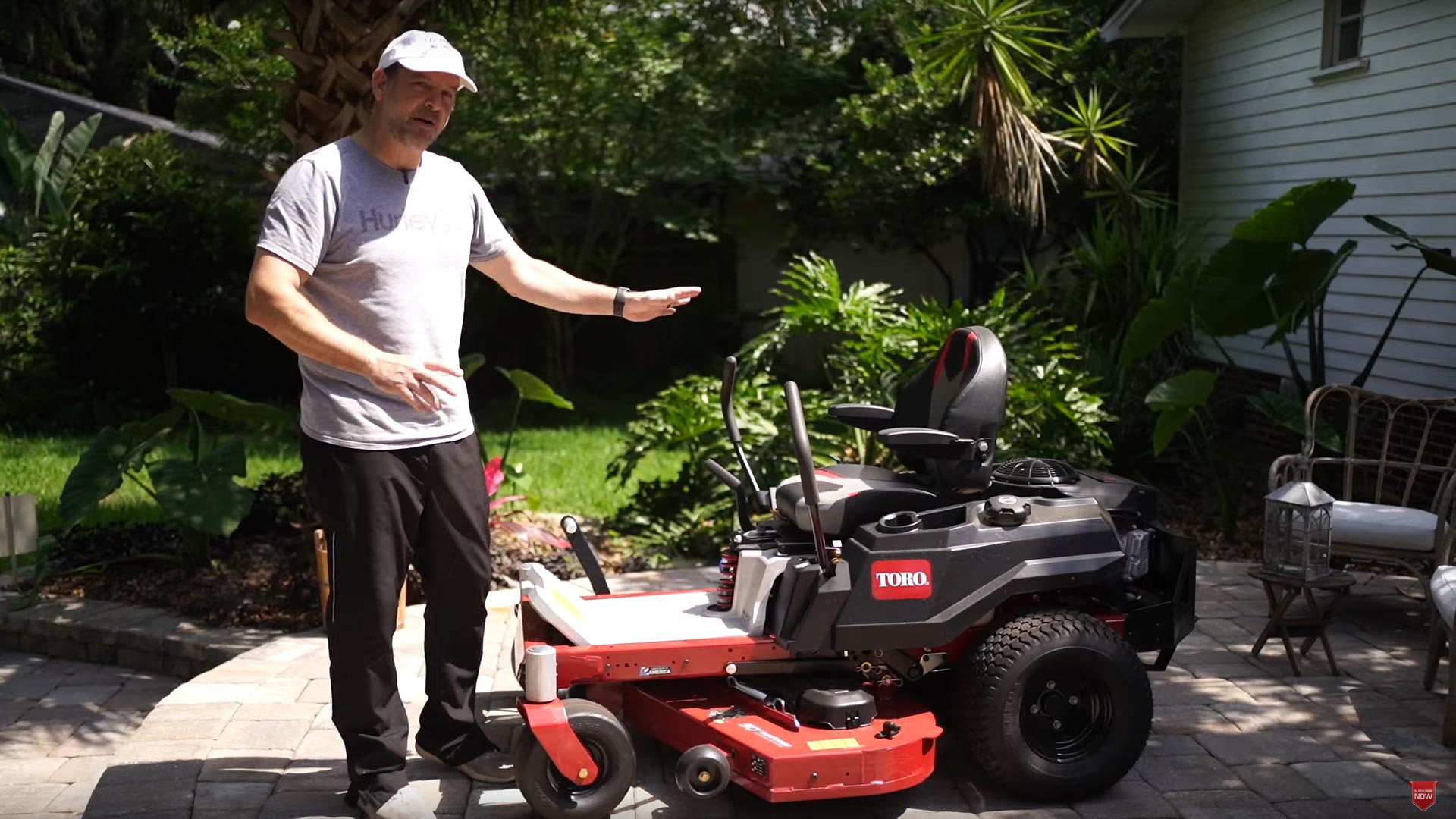 man showing a lawn mower